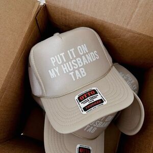 Put it on my Husbands Tab Trucker Hat